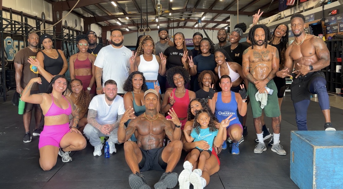 Coach Mac with a full bootcamp group after a session